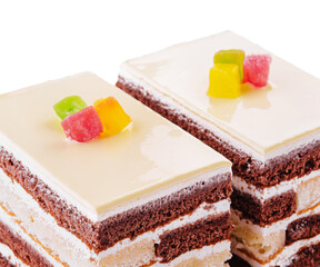 Delicious multilayer cocoa sponge cake with sugar mass