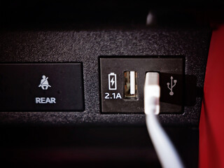 USB car charger port in the car
