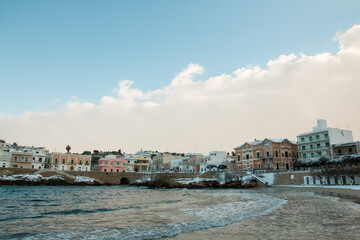 Fototapeta na wymiar Santa Maria al Bagno beach after a exceptional snowfall, Salento, Apulia, Italy