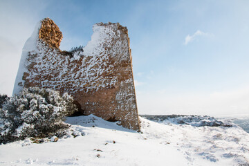 Uluzzo tower after a exceptional snowfall, Salento, Apulia, Italy