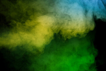 Green and white steam on a black background.