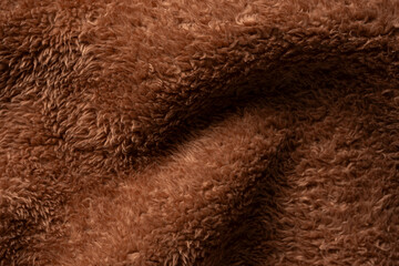 Texture of a brown faux fur as a background.