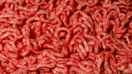Raw minced beef close-up, top view.