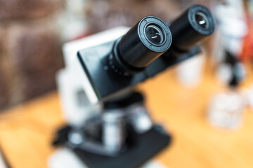 Fototapeta na wymiar Scientist microscope macro close up, soft focus.