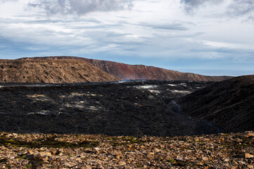Active Volcano eruption at Fagradalsfjall in the Meradalir valley, Iceland. Black lava field. Unique natural attraction. © Lizaveta