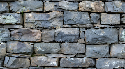 Fototapeta premium A Stone Wall Made of Rocks