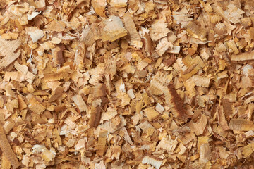 wood chips or shavings, small pieces of wood produced as a byproduct, shaved or chopped from larger...