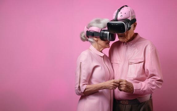 Smiling middle-aged married couple, dressed in pink leather jackets, wearing VR glasses.