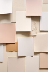 Neutral tone paper collage background. Chaotic paper cards