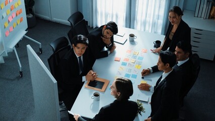 Top view of business people brainstorm idea by using sticky notes while planning marketing strategy...