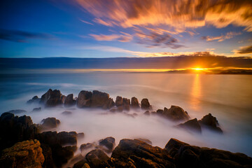 Sunrise on the shore of Pacific Grove, California. - obrazy, fototapety, plakaty