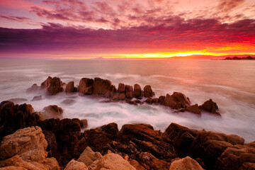 Sunrise on the shore of Pacific Grove, California.