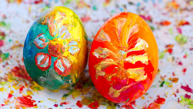 two colorful painted easter eggs