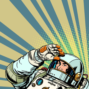Pop Art Retro A male astronaut looks over the horizon in his gear. Space promotions and offers for customers. Look into the distance and strive for your dreams.