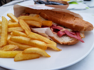 Close up view for sujuk meat burger in it is paper