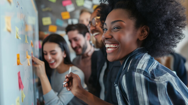 Planning, teamwork and business people writing in office for calendar, agenda or schedule management. Creative, goal and design team in problem solving meeting, brainstorming or solution discussion