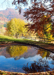 alpine lake with reflections of the mountains on the water