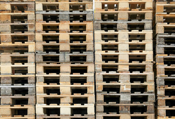 Background of pallets in the warehouse of shipping company