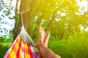closeup man legs in a hammock