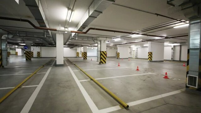 Empty underground car park with free parking spaces 