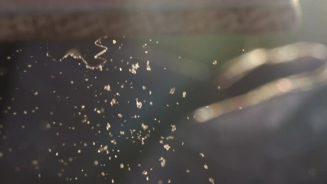 Close-up of a saw going thru wood. First in realtime then in Slowmotion