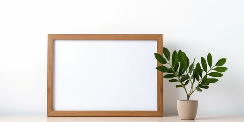 Fototapeta na wymiar Empty wooden frame on white background, mockup, minimalist
