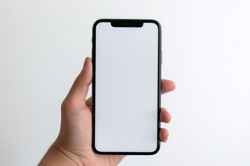 Close up man hand holding modern smart phone mockup.New modern black frameless smartphone mockup with blank white screen