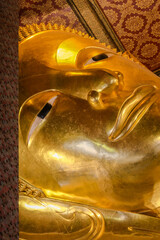 Beauty of Wat Pho Temple: The Reclining Sleeping Buddha Golden Head Stature 