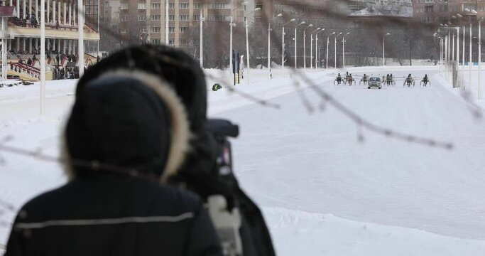  Car, starting horses and cameraman during drawing of winter traditional prizes for Oryol trotting breed on Moscow hippodrome, 4K