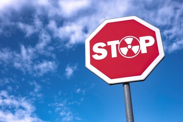 Stop traffic sign to cease nuclear tests and war