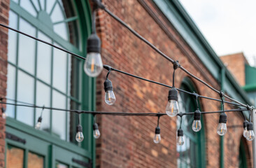 windows on a building with patio lights