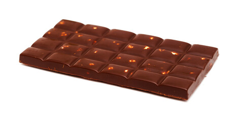 A bar of dark chocolate with hazelnuts isolated on white background 