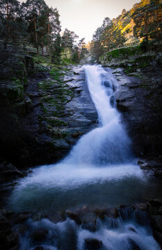 High mountain waterfall in winter.
