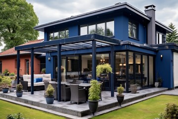 Idyllic summer retreat. modern houses serene terrace covered by a stylish canopy - obrazy, fototapety, plakaty