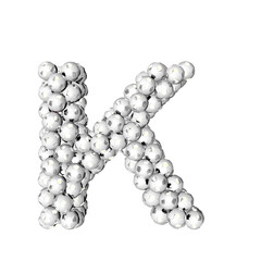 Symbol made from silver soccer balls. letter k