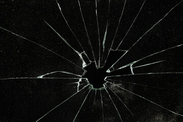 Cracked Pieces Broken Glass Hole on Black Background