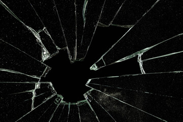 Cracked Pieces Broken Glass Hole on Black Background