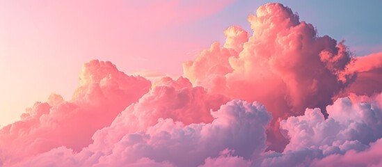 Vibrant pink sky adorned with dramatic clouds.