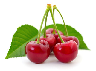 Sweet cherries with stem and leaves.