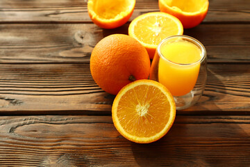 Fresh ripe juicy oranges on light background