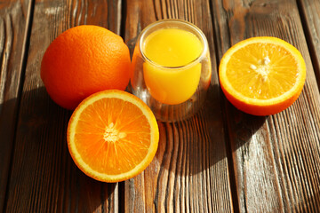 Fresh ripe juicy oranges on light background