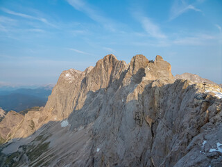 Panoramic view of majestic mountain peak Hoher Dachstein in Northern Limestone Alps, Styria, Austria. Scenic hiking trail in wilderness Austrian Alps. Peace of mind, calmness. Wanderlust in nature