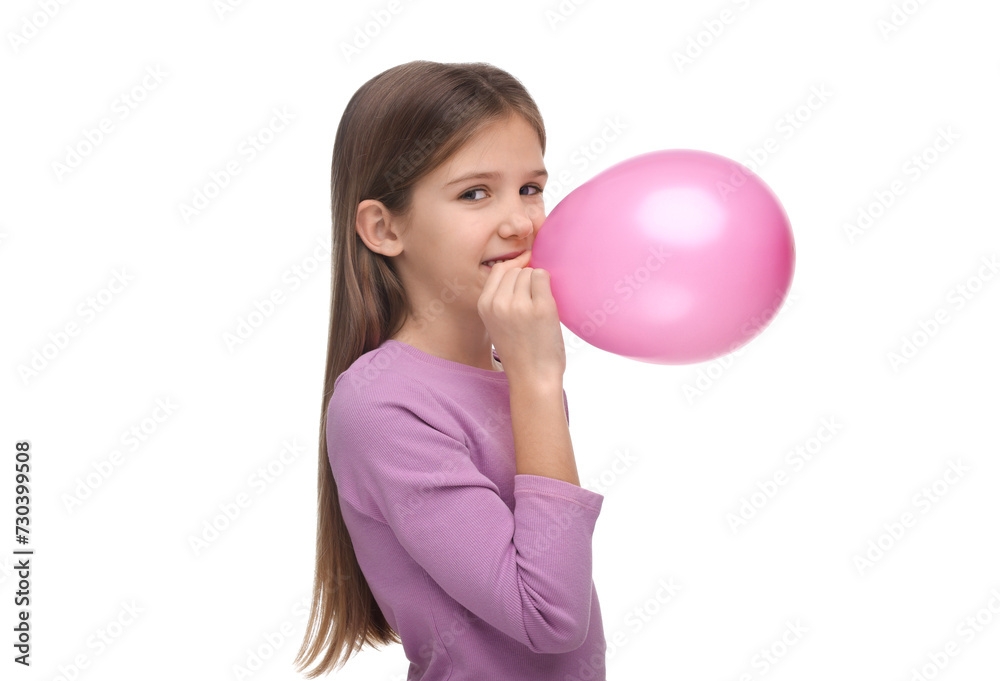 Wall mural Girl inflating pink balloon on white background