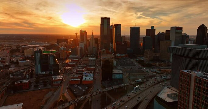 Beautiful golden hour in the modern city. Aerial view of Dallas, Texas, USA at sunset from top.