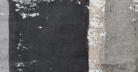 Painted grunge concrete wall background. Concrete wall texture with black stain of paint. Abstract wallpaper.