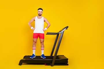 Full length portrait of confident sporty fitness person stand treadmill empty space offer isolated...