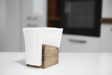 Wooden napkin holder in kitchen