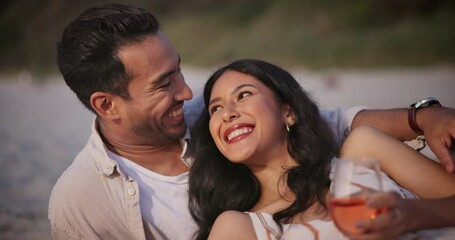 Love, picnic and wine with couple at beach for celebration, anniversary and relax on vacation. Happy, food and travel with man and woman on romantic seaside date for holiday, summer or party together - Powered by Adobe