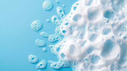 splash of foam from soap or shampoo on blue background