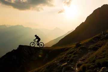 Fototapeten mountainbiker in the alps during sunset  © Mathias
